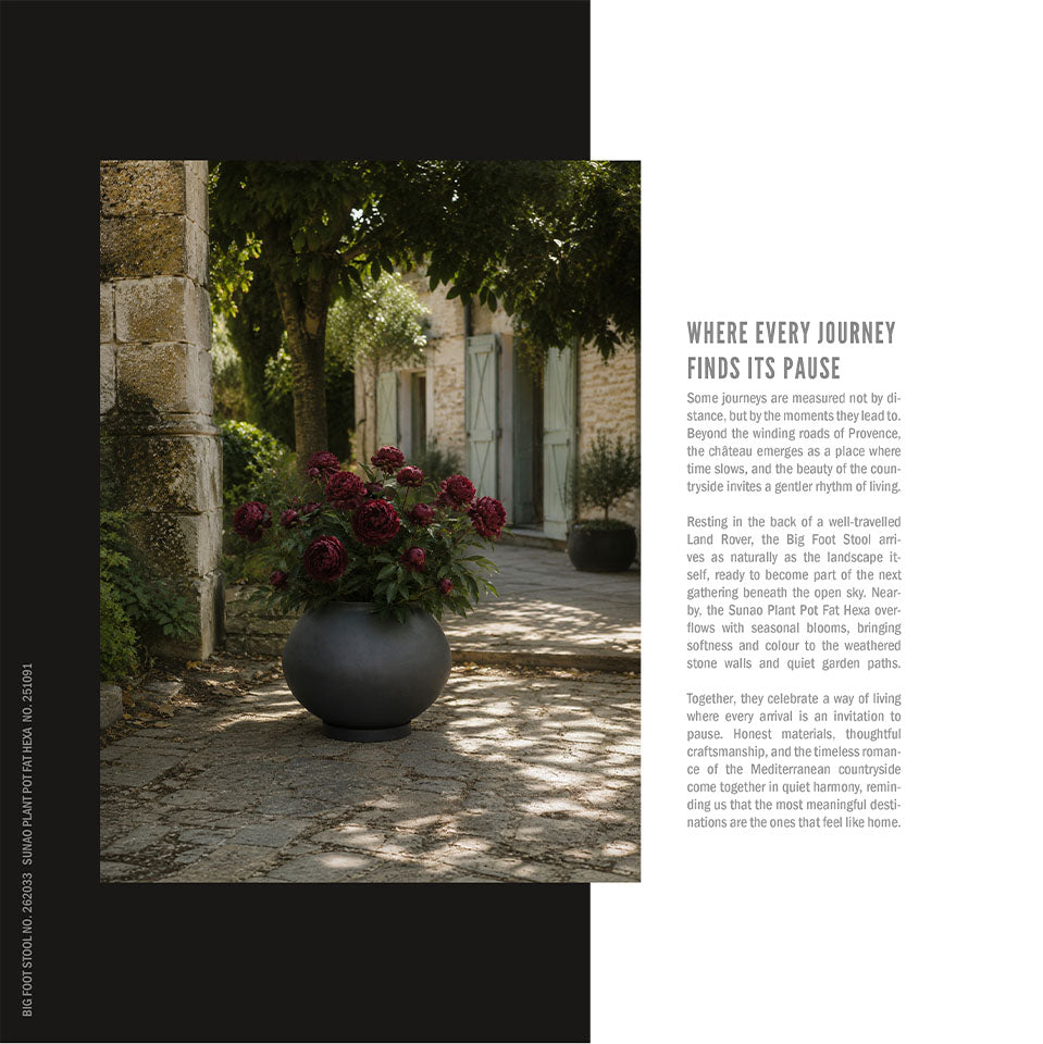 A printed or designed page with a black left panel showing a photograph of a large dark Sunao plant pot filled with burgundy flowers in a stone garden corridor, and a white right panel with the headline 'Where every journey finds its pause" and several paragraphs of text.