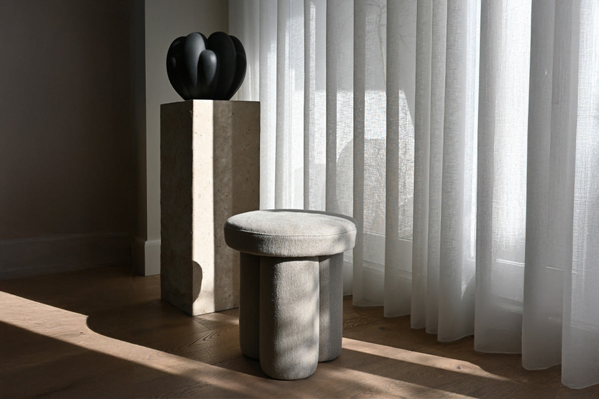 101 Copenhagen Big foot stool in linen, podium in limestone and A Bloom vase in black