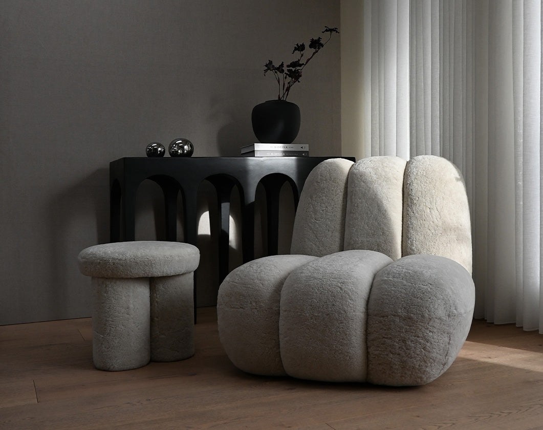 101 Copenhagen Toe Chair and Big foot stool in Sandshell Australian Sheepskin