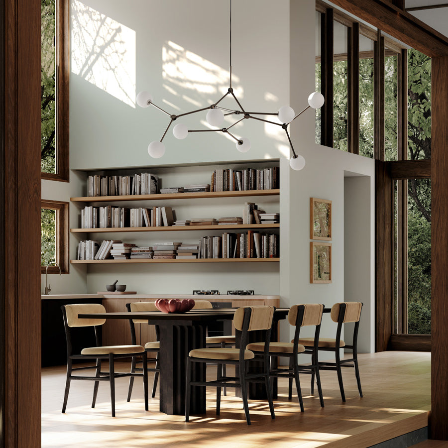 Dinning room with Arc Table, Nama dining chairs in Wool velvet, Bloom Tray and Drop Chandelier Bulp  
