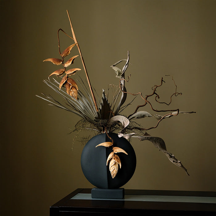 101 Copenhagen Guggenheim vase with dried flowers in an artistic setting