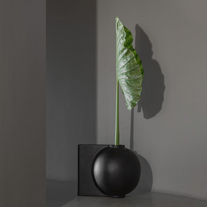 101 Copenhagen Offset vase with exotic botanical arrangement by Bosque
