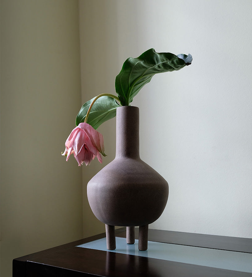 101 Copenhagen Duck vase fat with delicate floral arrangement by Aiku Floral