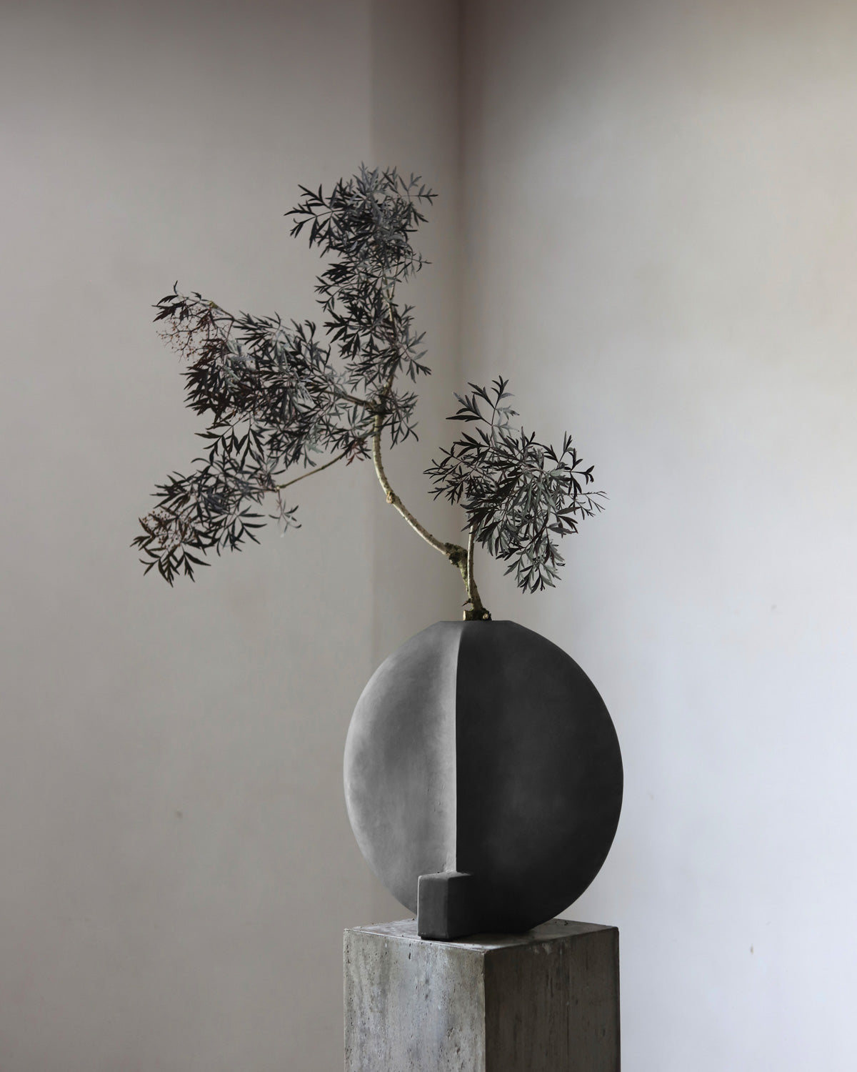101 Copenhagen Guggenheim Vase with botanical arrangement by Frida Kim