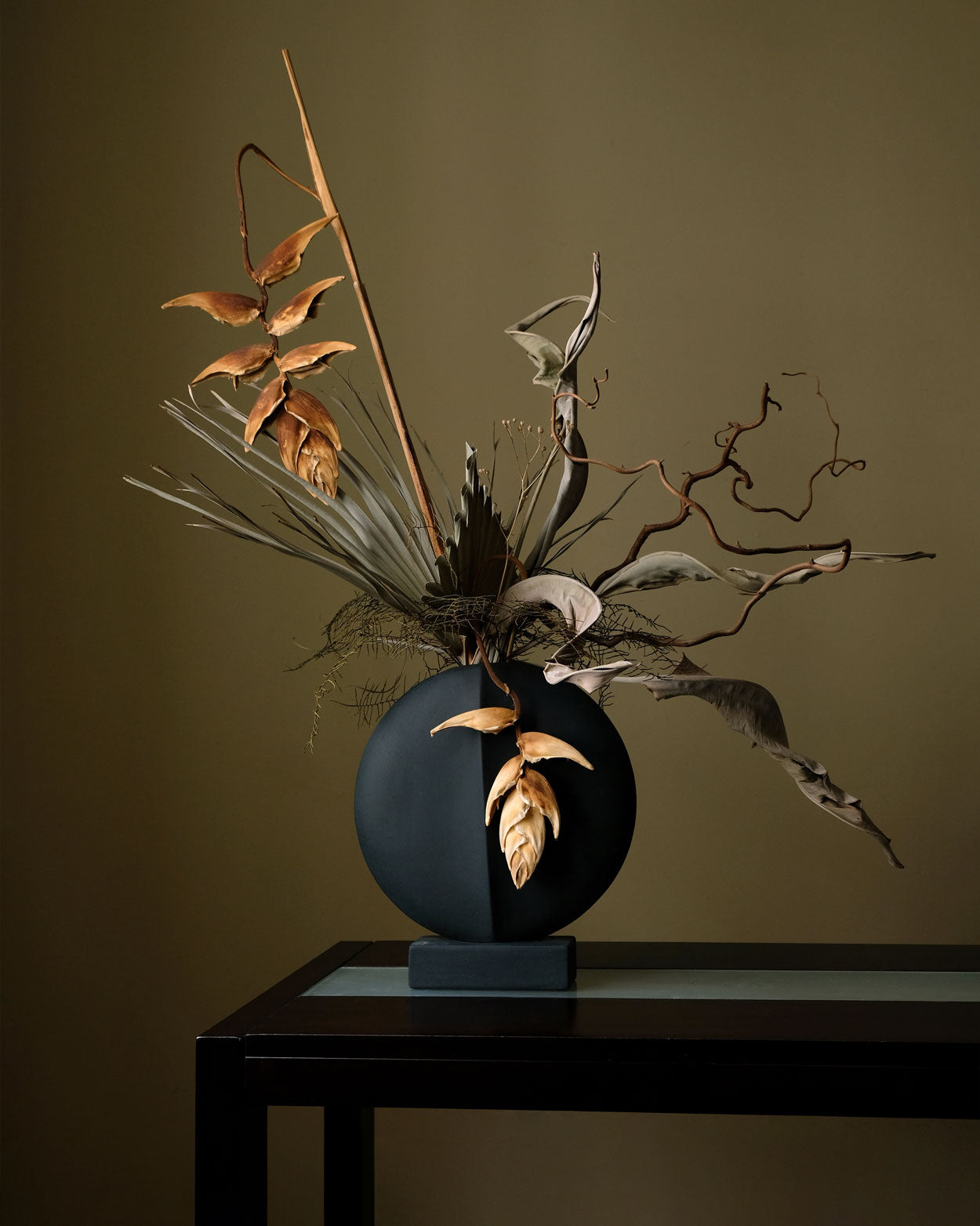 101 Copenhagen Guggenheim vase with dried flowers in an artistic setting