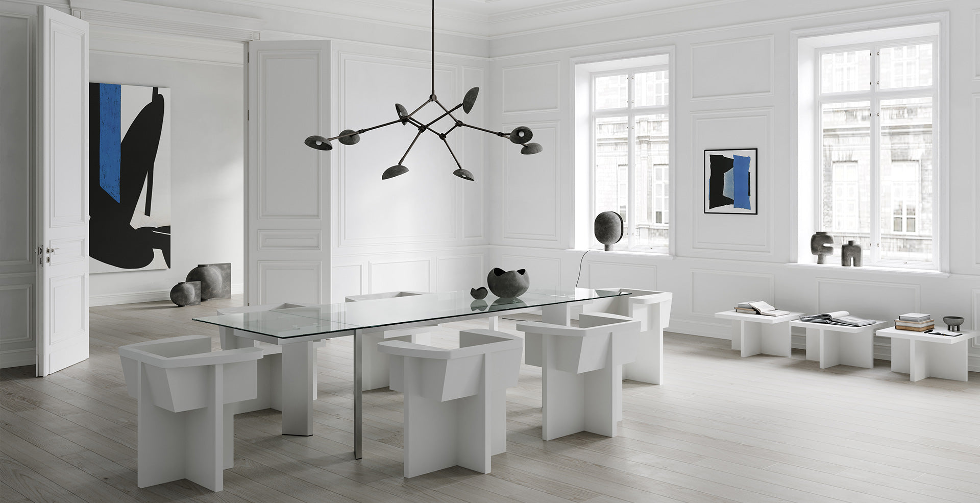 101 Copenhagen Oxidized Drop Chandelier and Clam table lamp in dining room with White Brutus dining chairs and Grey ceramics 