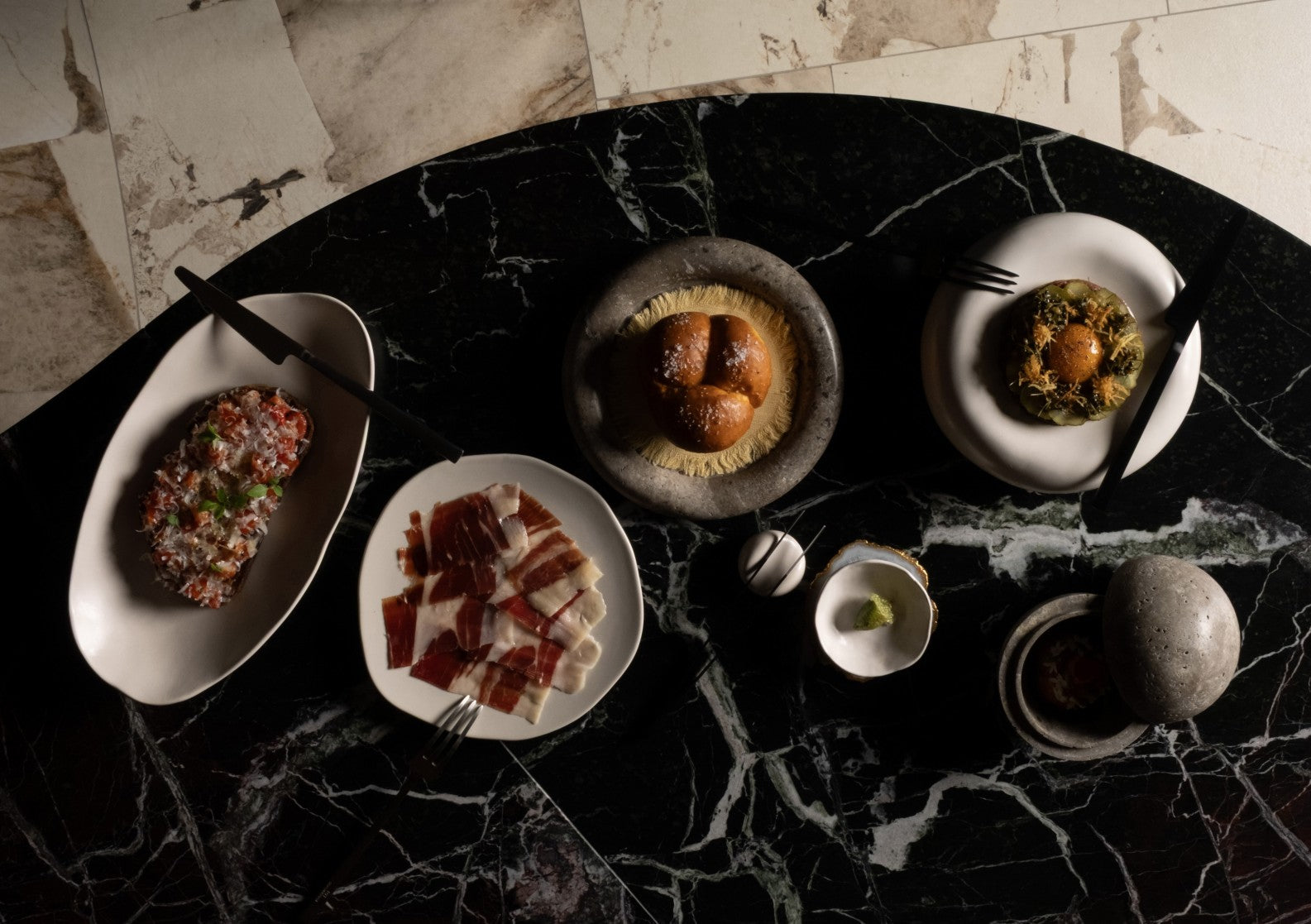 Native dinnerware and Kogei cutlery arranged with FUME cousine