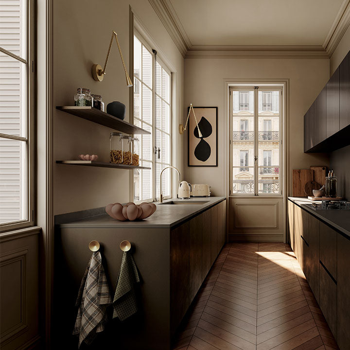 Modern kitchen with Snake Wall lamps, wooden cabinets, a sink, and a Bloom tray