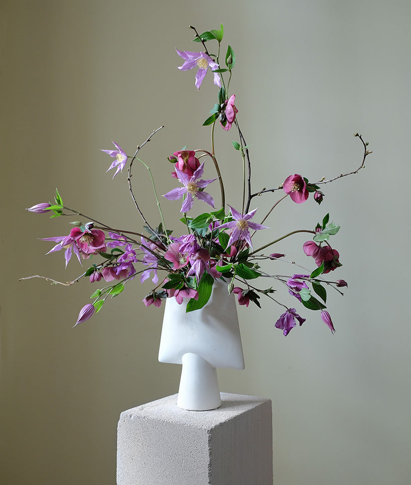 Colourfull floral arrangement by Aiku Floral in a white 101 Copenhagen Sphere square vase