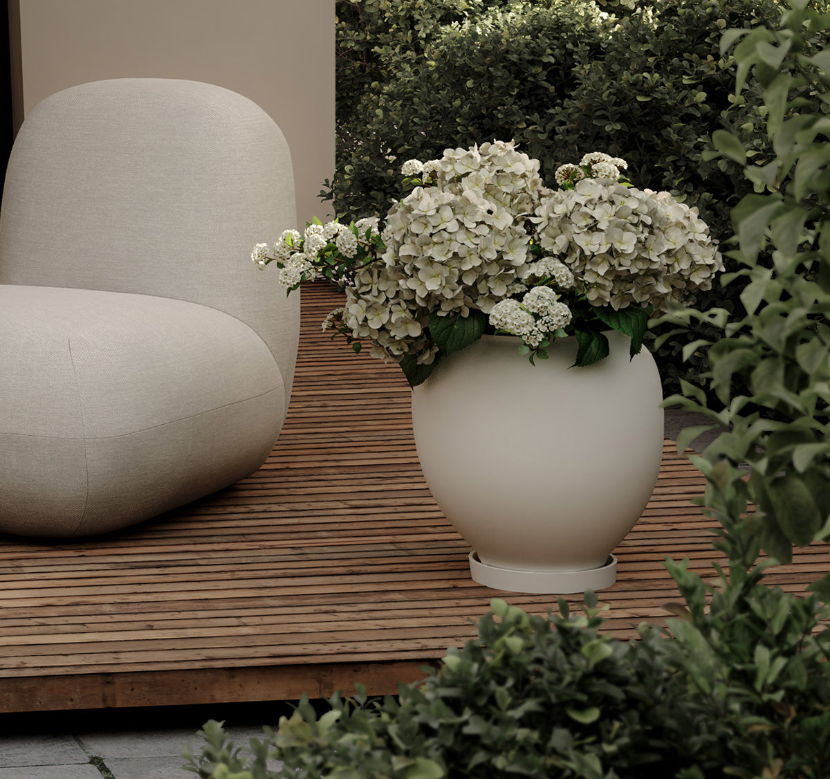101 Copenhagen Sunao plant pot and Toe Chair for outdoor