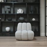 101 Copenhagen Toe Chair in Sand linen Colour 8047-2 in front of bookcase with vases