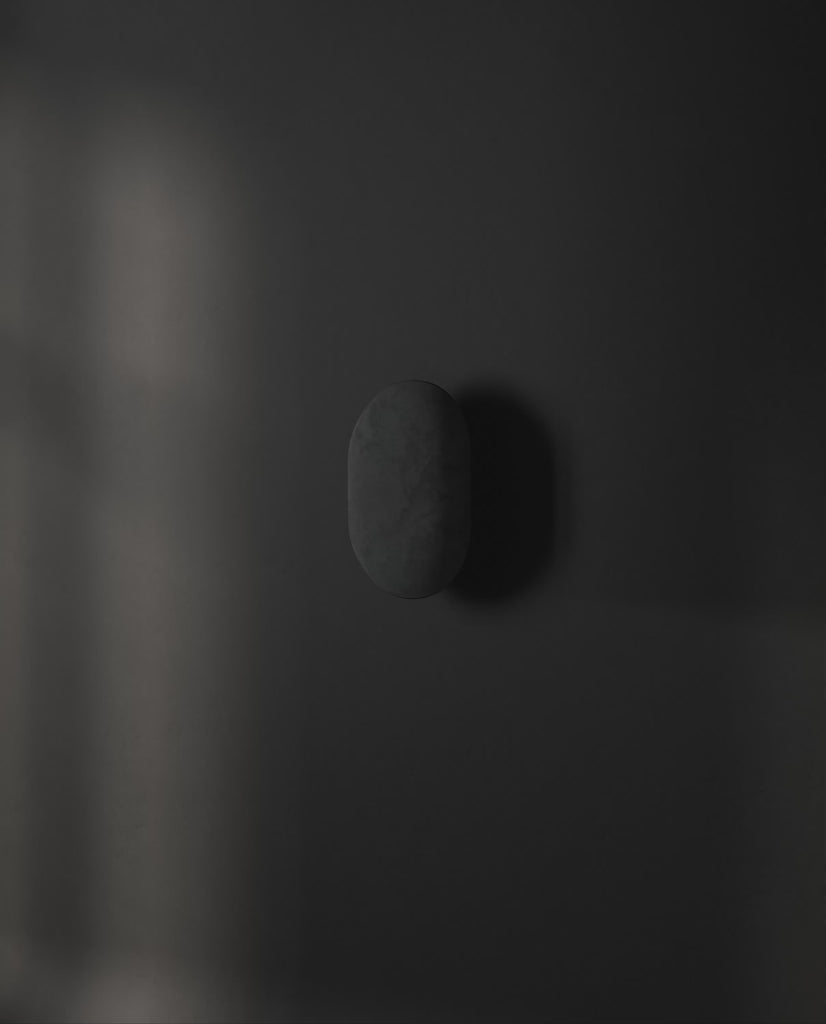 101 Copenhagen Clam Wall Lamp - Oxidized turned on and off