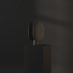 101 Copenhagen Clam Table Lamp - Oxidized turned on and off
