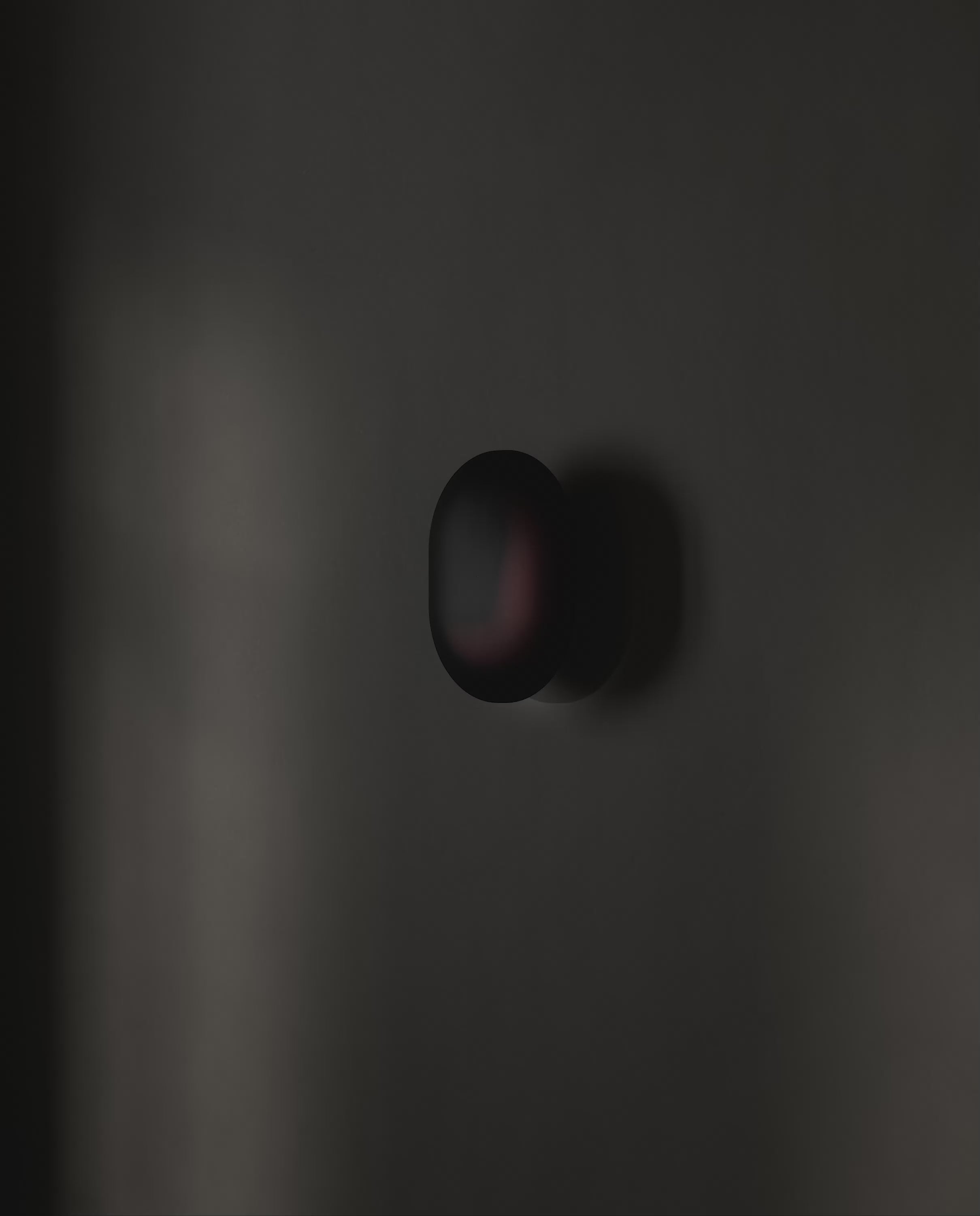 101 Copenhagen Clam Wall Lamp -  Burned Black turned on and off