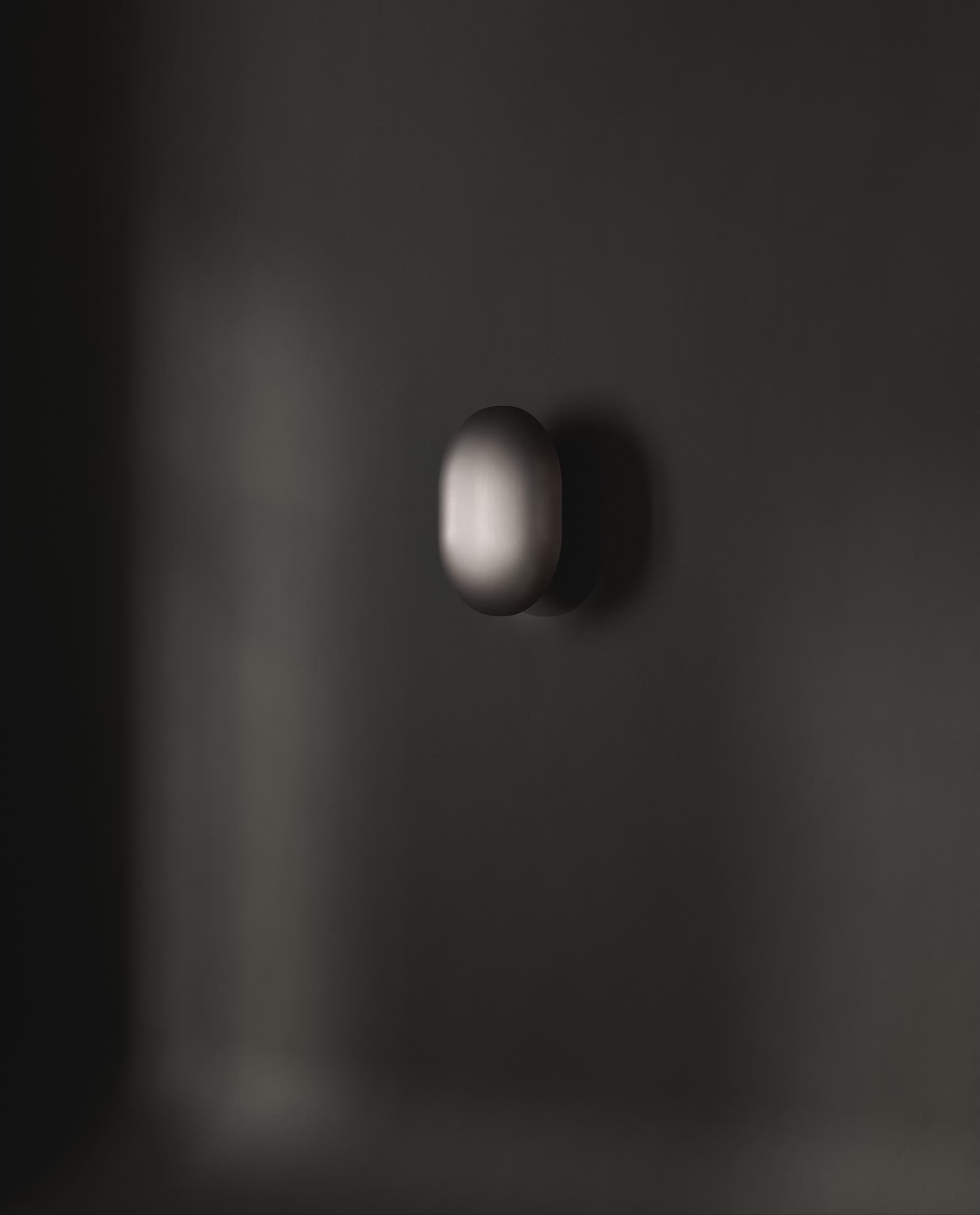 101 Copenhagen Clam Wall Lamp -  Bronze turned on and off